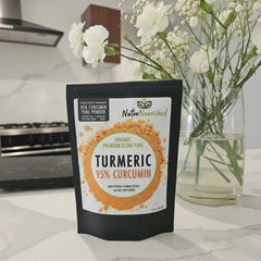Turmeric powder package with visible branding on a kitchen counter.