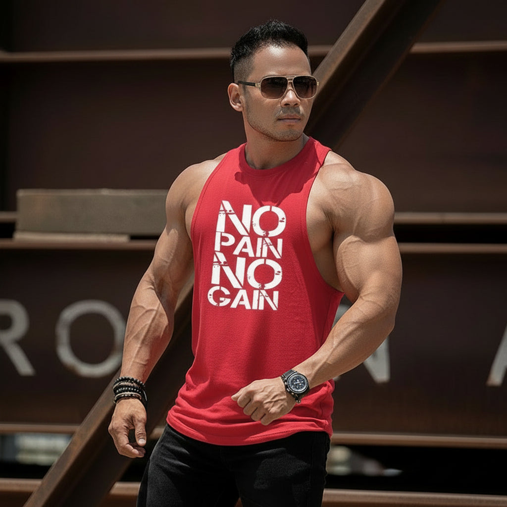 Muscular man wearing a red 'No Pain No Gain' tank top in front of a blurred background.