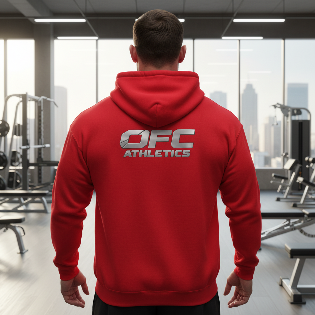 Person wearing a red hoodie with 'OFC Athletics' logo in a gym setting